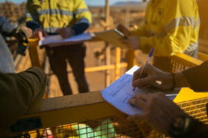 Working gentlemen conducting job hazard analysis.