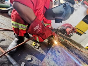 Man welding.