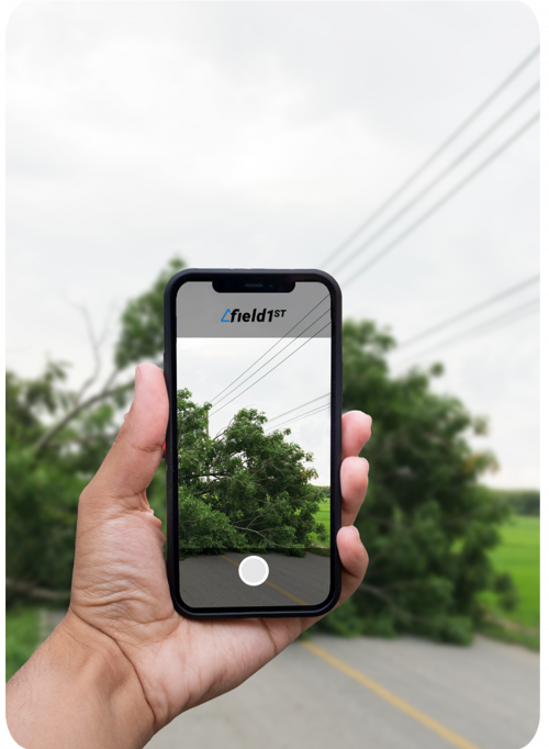 hand taking photo of street